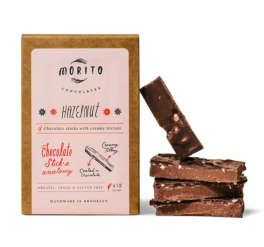 Our signature chocolate stick. Balanced, nutty, and fruity profile in combination with the beautiful hazelnut flavor. Topped with roasted chopped hazelnuts. Made with 68% cacao, organic dark chocolate. These Hazelnut chocolate sticks are organic, vegan, gluten-free and low in sugar. We use simple ingredients, and produce our chocolates in small batches without added preservatives.