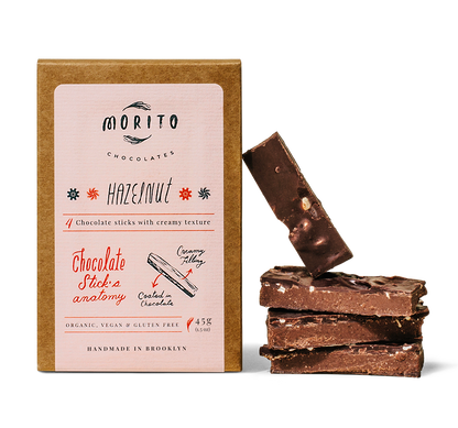 Our signature chocolate stick. Balanced, nutty, and fruity profile in combination with the beautiful hazelnut flavor. Topped with roasted chopped hazelnuts. Made with 68% cacao, organic dark chocolate.  These Hazelnut chocolate sticks are organic, vegan, gluten-free and low in sugar. We use simple ingredients, and produce our chocolates in small batches without added preservatives.